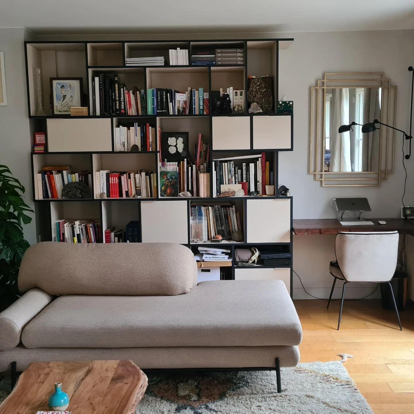 Living room with bookshelf and kid-friendly sofa